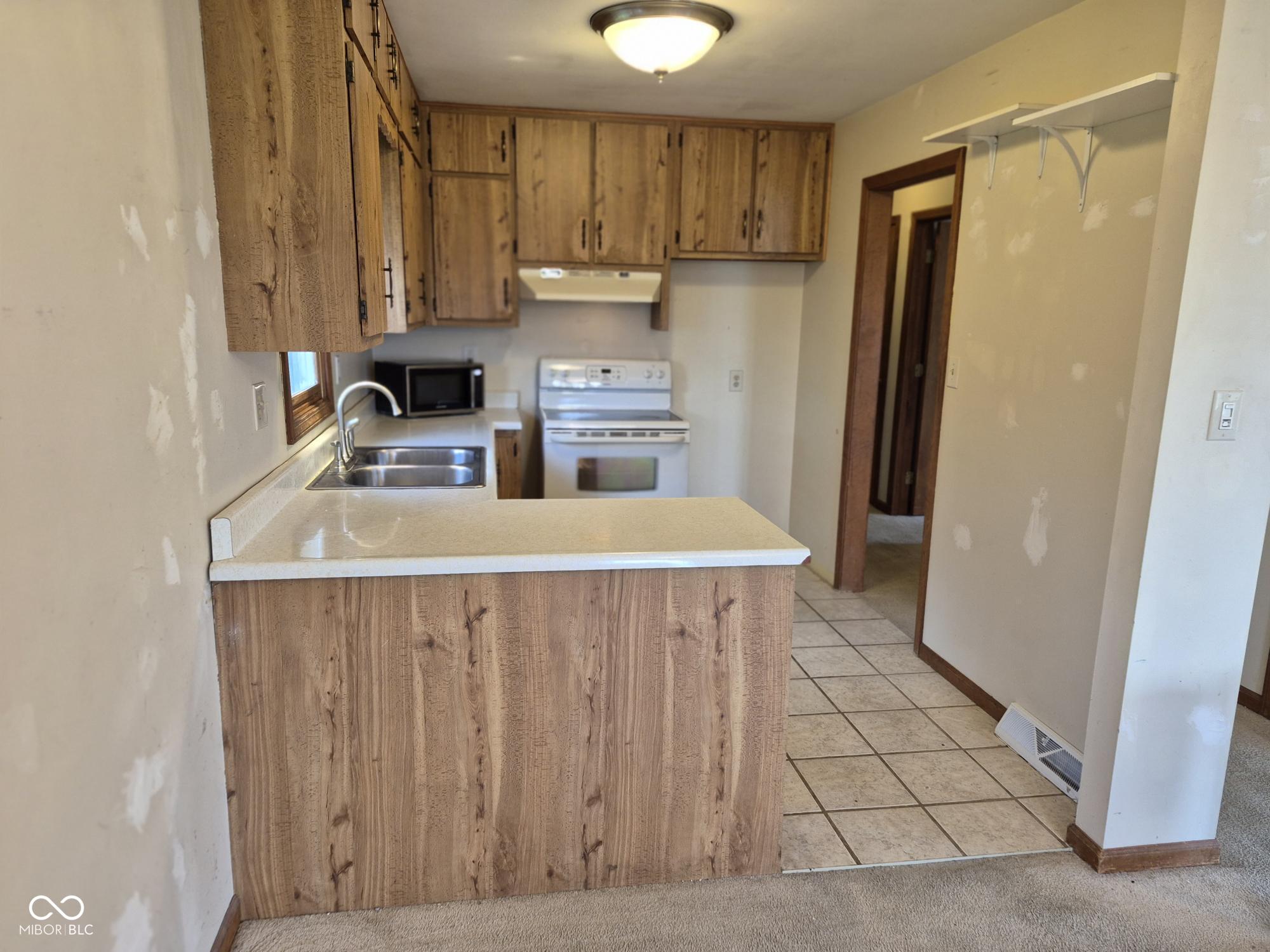 9036 E Raymond Street, Indianapolis, IN, 46239 photo 4 of 19